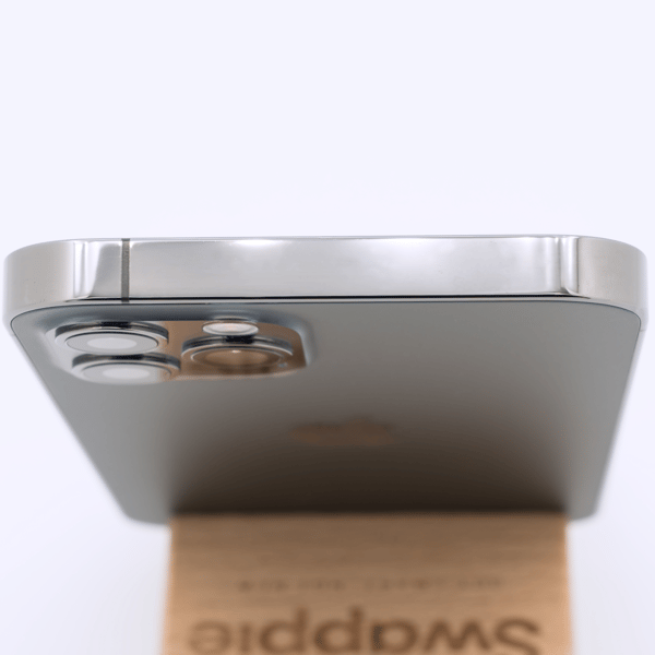 Premium condition, top edge — the top of the frame of a typical phone at this grade