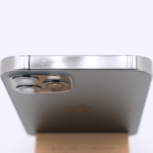 Very Good condition, top edge — the top of the frame of a typical phone at this grade